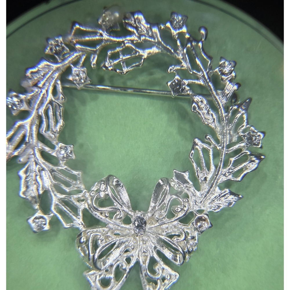 CRISTOPHER RADKO Silvertone Brooch Vtg Christmas Wreath Clear Rhinestone Pin